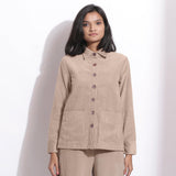 Front View of a Model wearing Beige Corduroy Button-Down Pocket Shirt