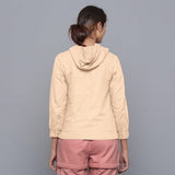 Back View of a Model wearing Beige Flannel Straight Hoodie Top