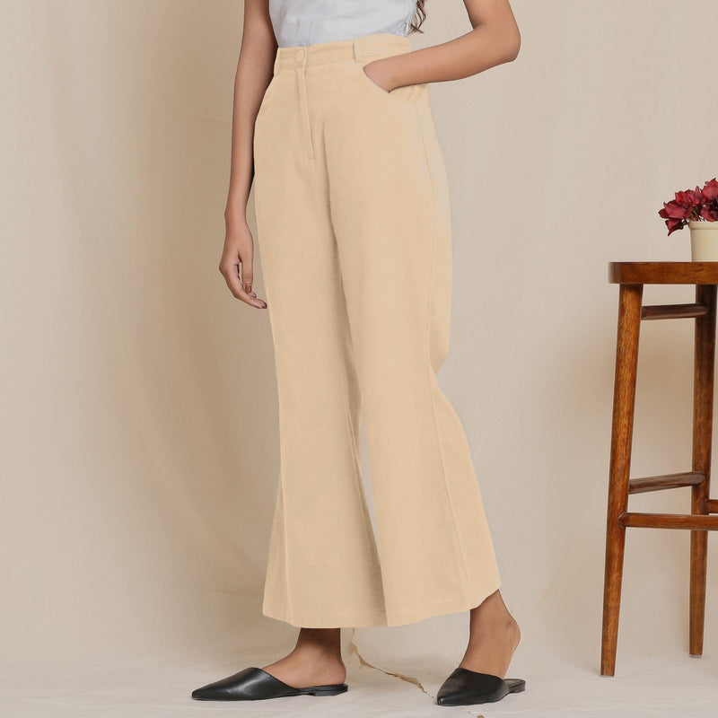 Left View of a Model wearing Warm Cotton Flannel Beige Bootcut Pants