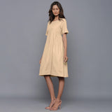 Left View of a Model wearing Beige Paneled Cotton Flannel Dress