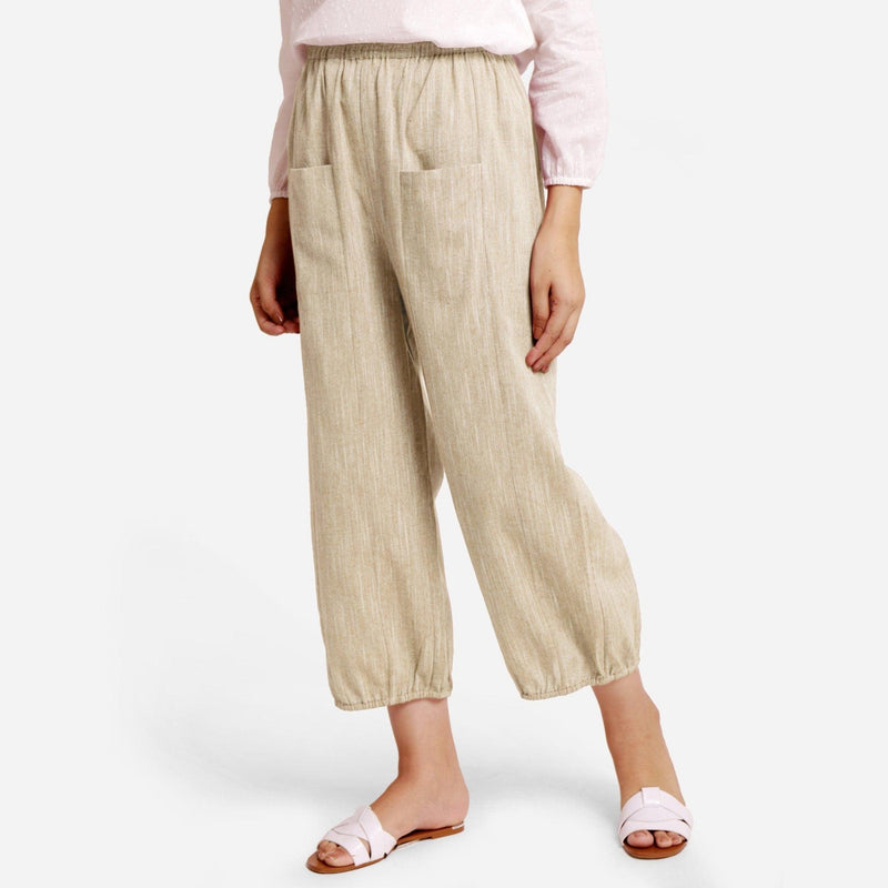 Front View of a Model wearing Beige Yarn Dyed Cotton Harem Pant