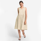 Front View of a Model wearing Yarn Dyed Cotton Beige Yoke Dress