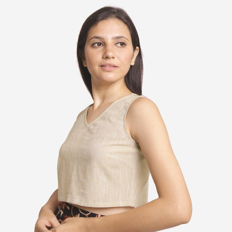 Left View of a Model wearing Solid Beige Yarn Dyed Cotton Crop Top