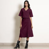 Front View of a Model wearing Berry Wine Wrap Top and A-Line Skirt Set