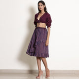 Left View of a Model wearing Berry Wine Reversible Frilled Wrap Skirt