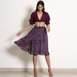 Front View of a Model wearing Berry Wine Reversible Frilled Wrap Skirt