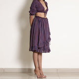 Right View of a Model wearing Berry Wine Reversible Frilled Wrap Skirt