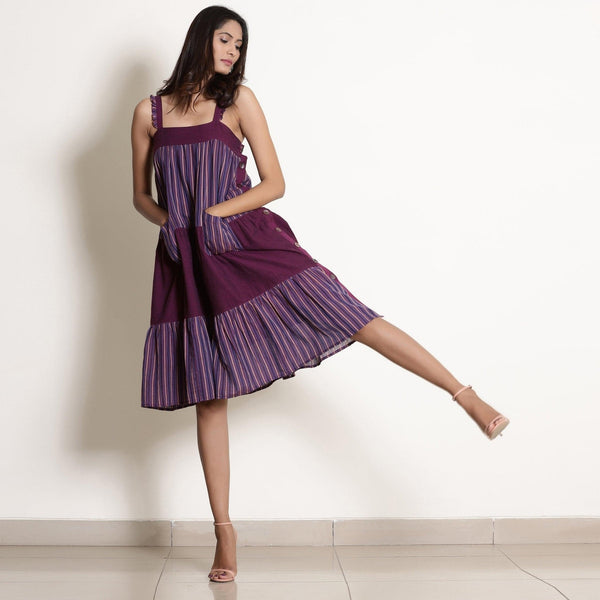 Front View of a Model wearing Berry Wine Striped Cotton Knee Length Tier Dress