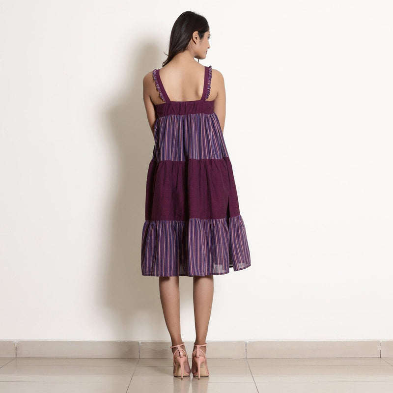 Back View of a Model wearing Striped Berry Wine Strappy Tier Dress