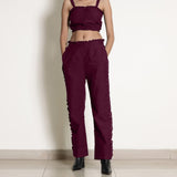 Front View of a Model wearing Warm Berrry Wine Frilled Straight Pant