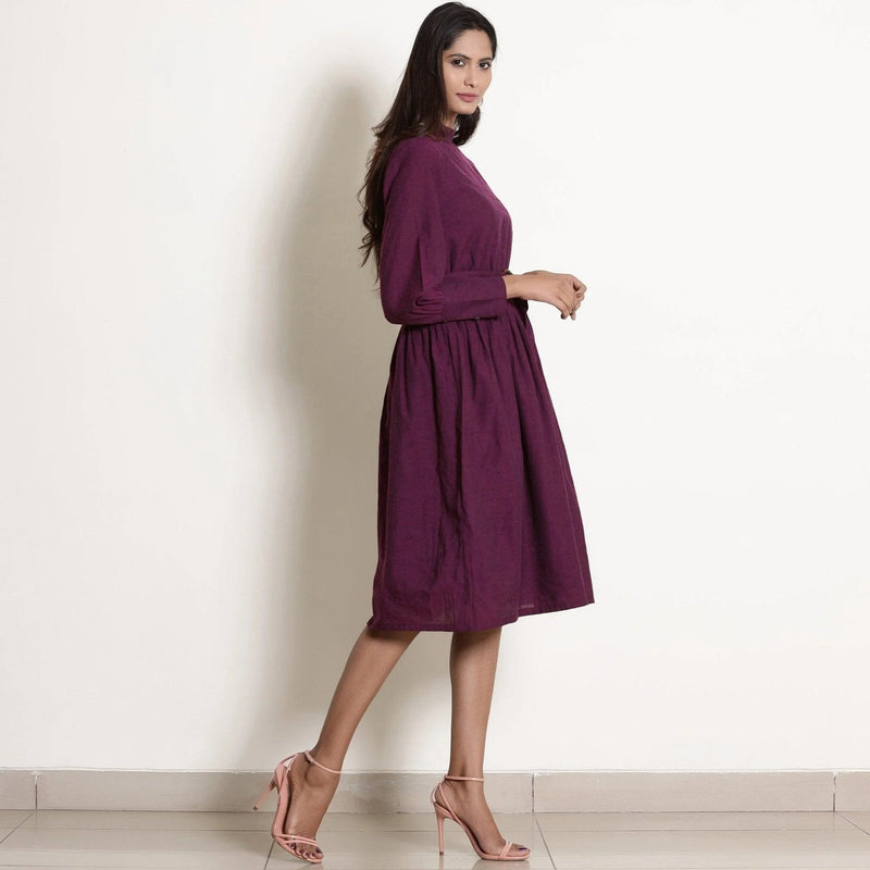 Right View of a Model wearing Berry Wine Warm Cotton Fit Knee Length Fit and Flare Dress