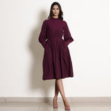 Front View of a Model wearing Warm Berry Wine Fit and Flare Dress