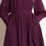 Front Detail of a Model wearing Warm Berry Wine Fit and Flare Dress