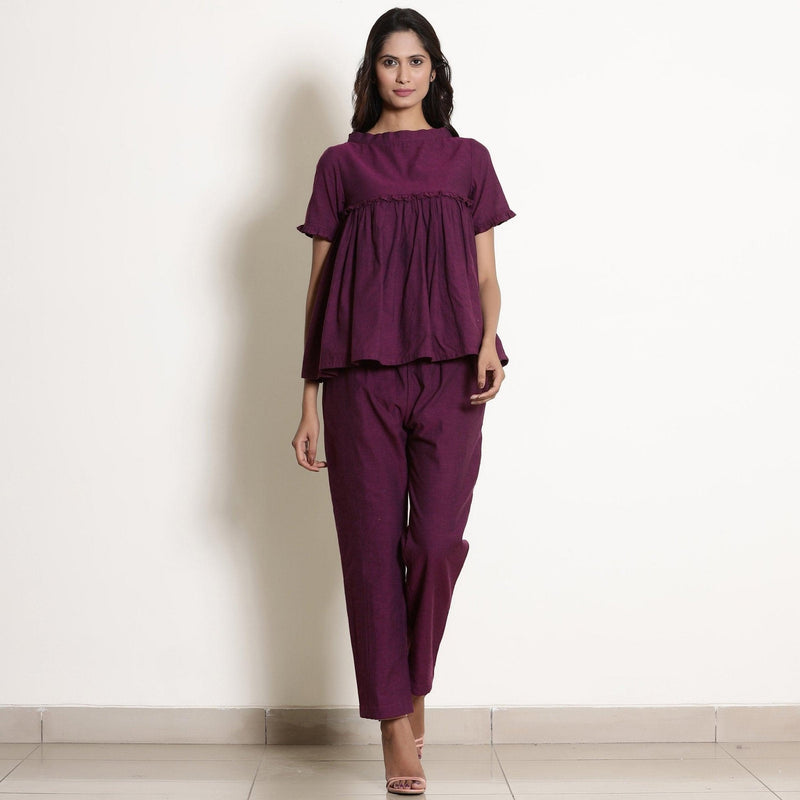 Front View of a Model wearing Warm Berry Wine Gathered Frilled Top