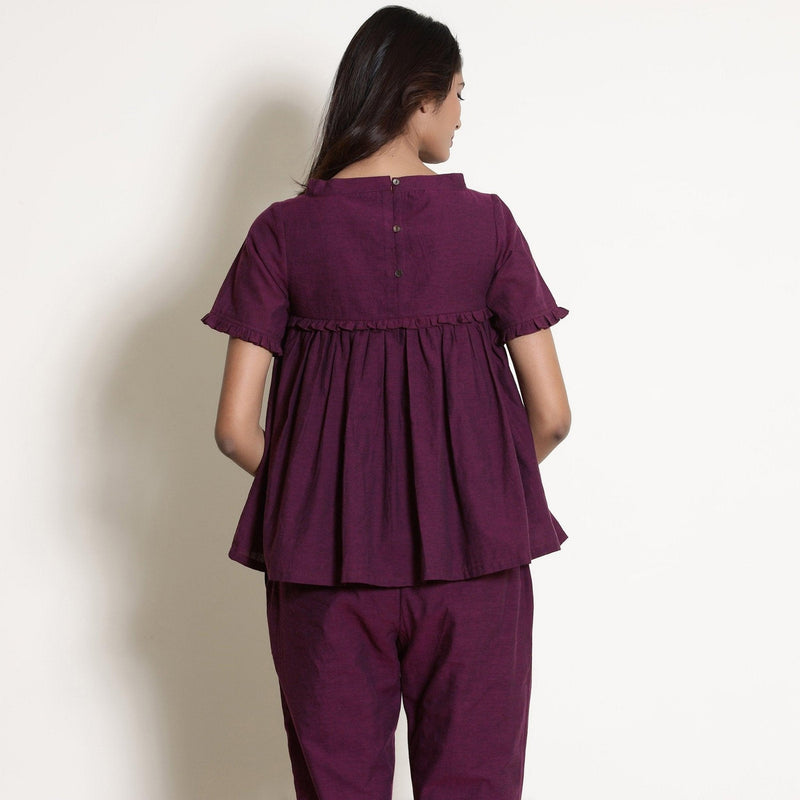 Back View of a Model wearing Warm Berry Wine Gathered Frilled Top