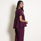 Right View of a Model wearing Warm Berry Wine Gathered Frilled Top