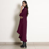 Left View of a Model wearing Warm Berry Wine Frilled Neck High Low Dress