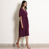 Right View of a Model wearing Warm Berry Wine Loose Fit Jumpsuit