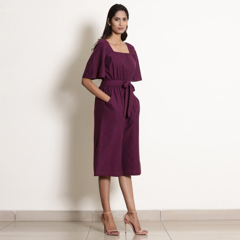 Right View of a Model wearing Warm Berry Wine Loose Fit Jumpsuit