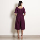 Back View of a Model wearing Warm Berry Wine Loose Fit Jumpsuit