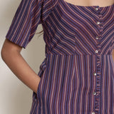 Front Detail of a Model wearing Warm Berry Wine Striped Button-Down Dress