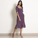 Right View of a Model wearing Warm Berry Wine Striped Button-Down Dress