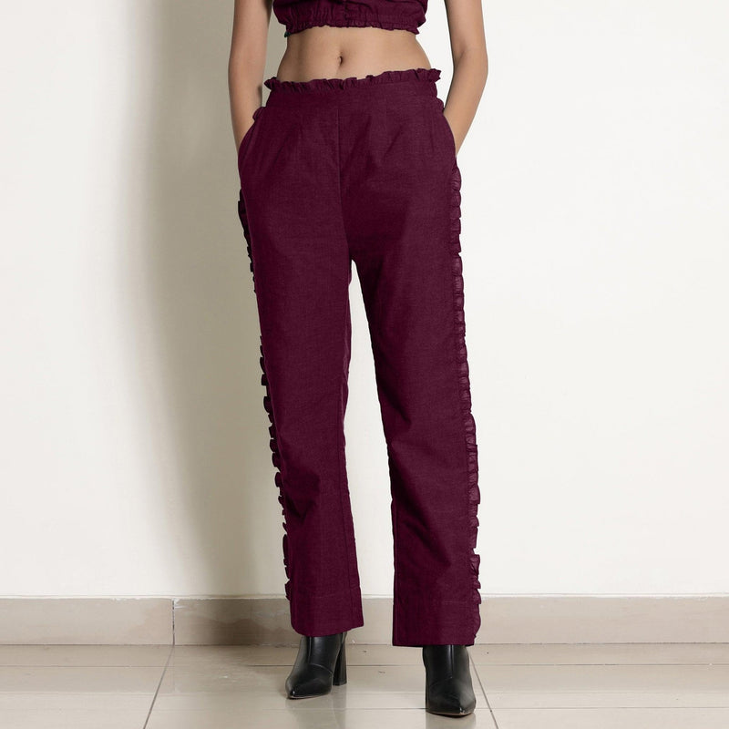 Front View of a Model wearing Warm Berrry Wine Frilled Straight Pant
