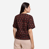 Back View of a Model wearing Bagru Block Print Black Tie Up Blouse