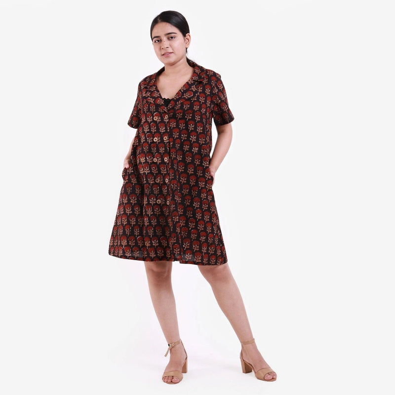 Front View of a Model wearing Black Block Print Cotton Knee Length Shirt Dress