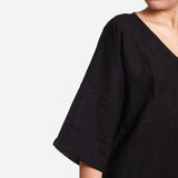 Close View of a Model wearing Black Loose Fit Drop Shoulder Top