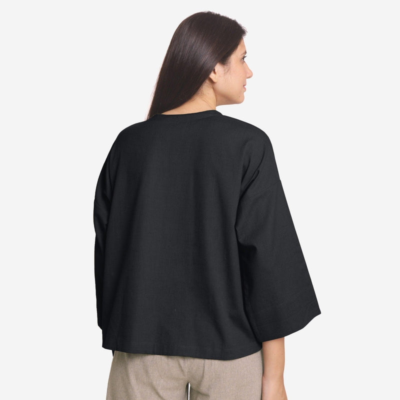 Back View of a Model wearing Black Cotton Flax Flared A-Line Top