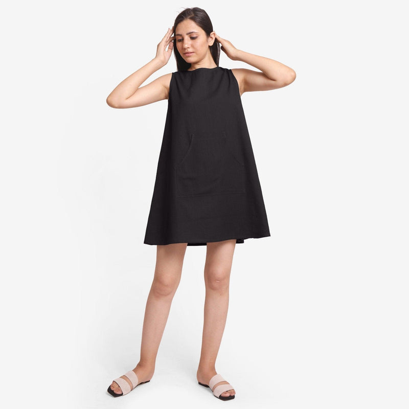 Front View of a Model wearing Black Cotton Flax Kangaroo Pocket Dress