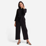 Front View of a Model wearing Black Wide Legged Cotton Overall