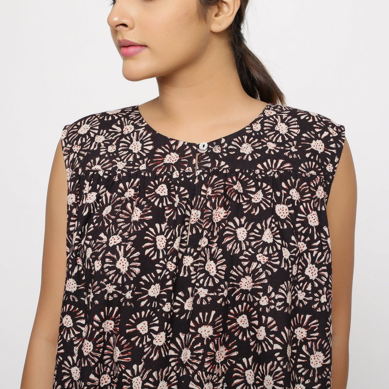 Front Detail of a Model wearing Bagru Floral Print Black Gathered Yoke Top