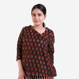 Front View of a Model wearing Bagru Block Print Black Floral Blouse