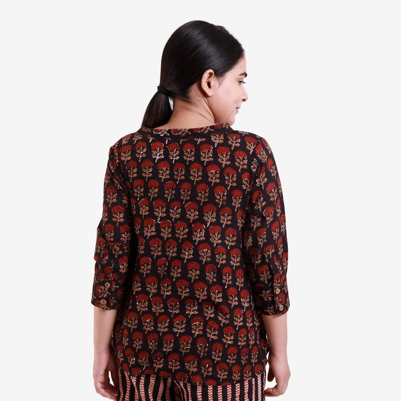 Back View of a Model wearing Bagru Block Print Black Floral Blouse