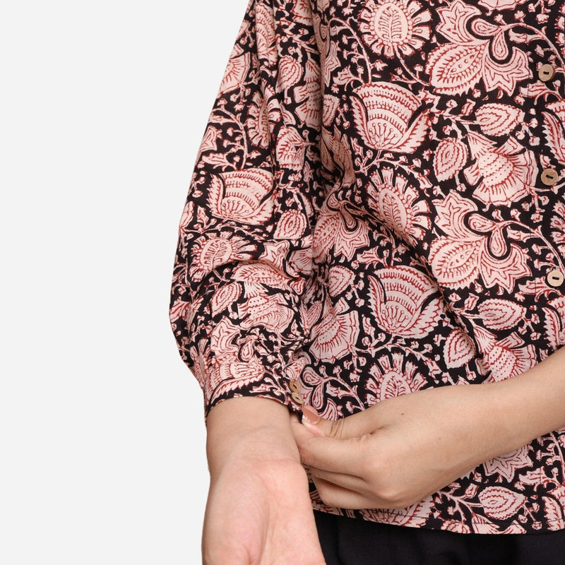 Front Detail of a Model wearing Black Floral Block Printed Asymmetric Cotton Shirt