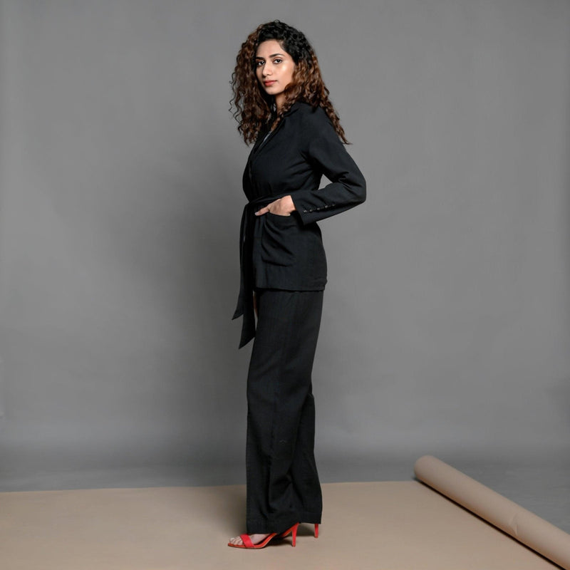 Left View of a Model wearing Black Handspun Cotton Belted Blazer