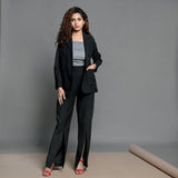 Front View of a Model wearing Black Handspun Cotton Belted Blazer