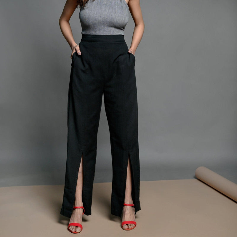 Front View of a Model wearing Black Handspun Cotton High Rise Slit Pants