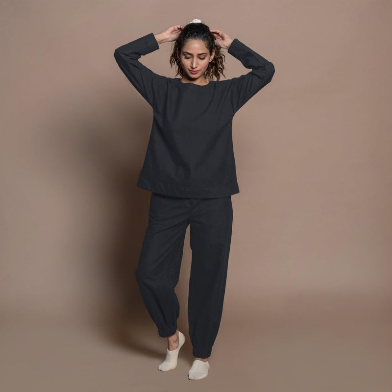 Front View of a Model wearing Black Warm Cotton Flannel Elasticated High-Rise Jogger Pant