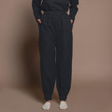 Front View of a Model wearing Black Warm Cotton Flannel Elasticated High-Rise Jogger Pant