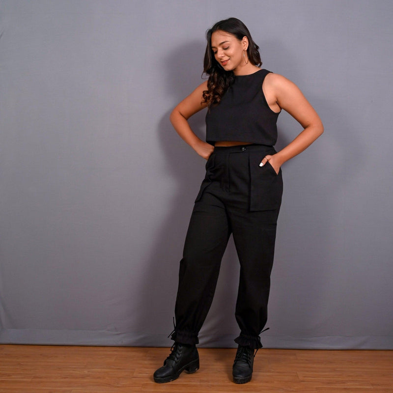 Left View of a Model wearing Black Warm Cotton Flannel High-Rise Convertible Jogger Cargo Pant