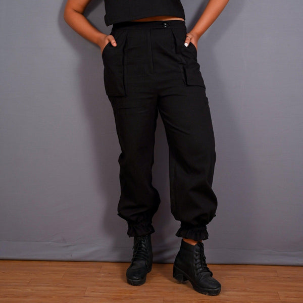 Front View of a Model wearing Black Warm Cotton Flannel High-Rise Convertible Jogger Cargo Pant