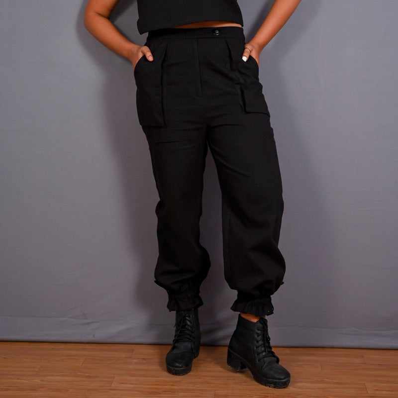 Front View of a Model wearing Black Warm Cotton Flannel High-Rise Convertible Jogger Cargo Pant