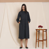 Front View of a Model wearing Black Warm Cotton Flannel Peter Pan Midi Dress