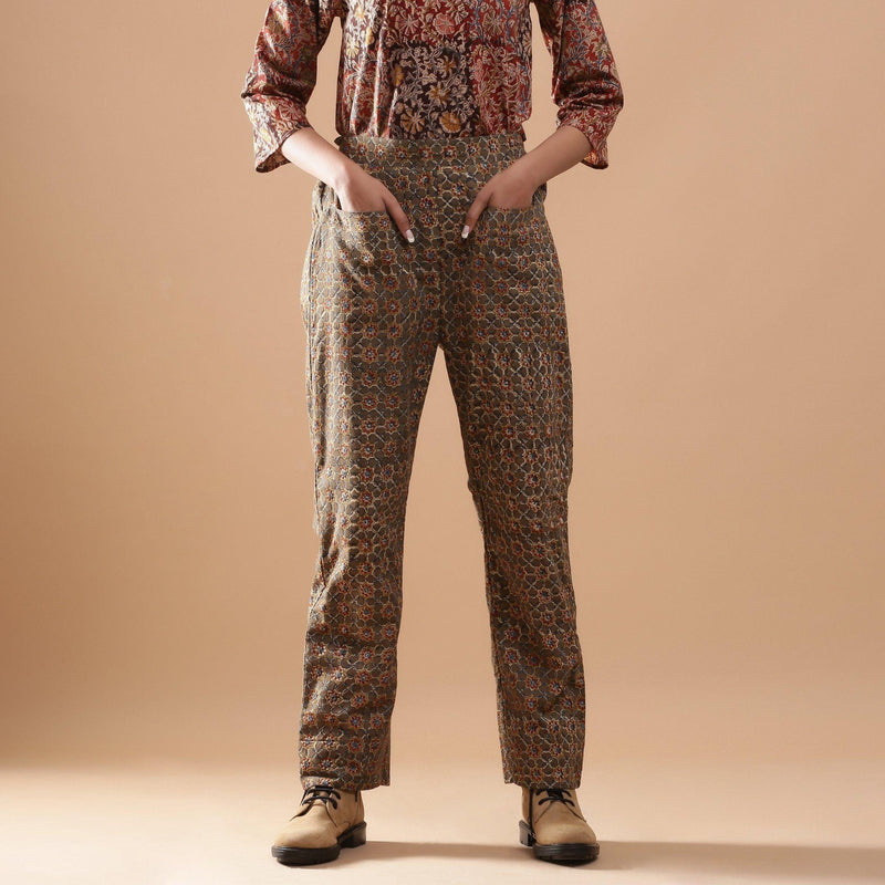 Front View of a Model wearing Warm Muddy Green Kalamkari Straight Pant