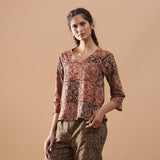 Front View of a Model wearing Muddy Red Kalamkari Raglan Sleeves Top