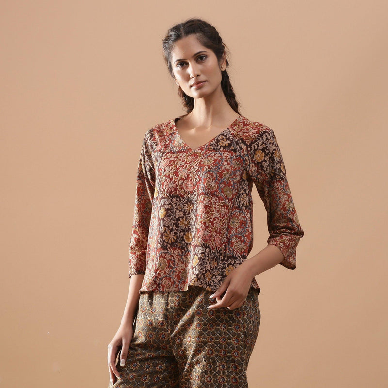 Front View of a Model wearing Muddy Red Kalamkari Raglan Sleeves Top