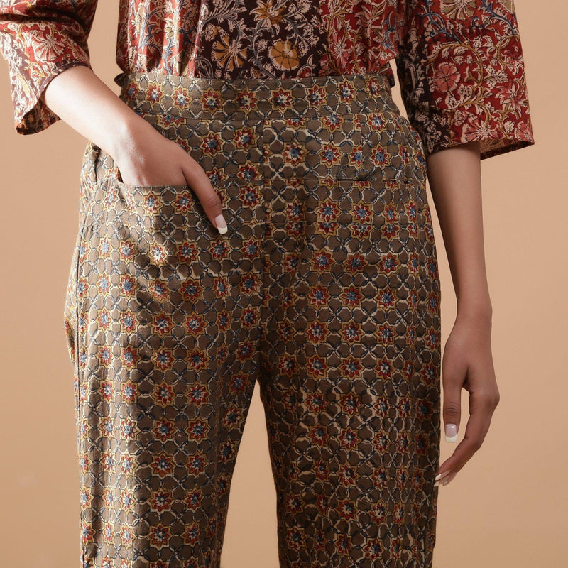 Front Detail of a Model wearing Warm Muddy Green Kalamkari Straight Pant